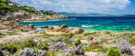 Costline of Costa Serena with sandstone rocks and sea waves, Sardinia, Italyの写真素材