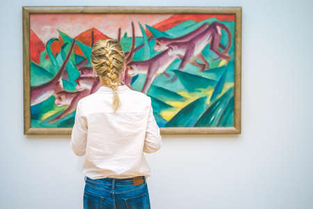 HAMBURG, GERMANY - 9 JULY 2017: Hamburg Kunsthalle art museum. Jung woman in front of paintingのeditorial素材