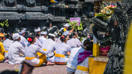 GOA LAWAH, BALI, INDONESIA - November 3, 2016: Balinese praying on ceremony at Pura Goa Lawah temple, Bali, Indonesiaのeditorial素材