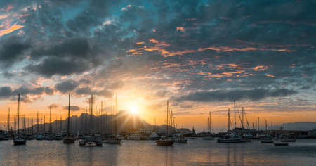 Beautiful sunset over Monte Cara mountain in hardor of Mindelo. Sao Vicente Cape Verdeの写真素材