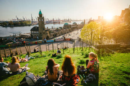 Hamburg, Germany - April 18, 2018: Famous Hamburger Landungsbruecken with commercial harbor and Elbe river, St. Pauli district, Hamburg, Germanyのeditorial素材