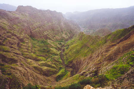 Breathtaking panoramic view from Delgadinho mountain ridge and valley with dry waterfall. Santo...