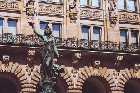 Bronze statue of Hygieia on Brunnen fountain near Hamburger Rathaus - Town Hallの写真素材