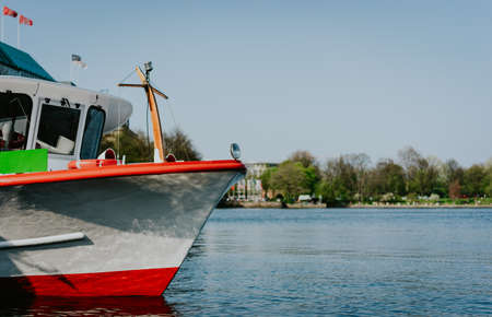Close up of traditional steamer boat for cruise on the water of Lake Alster, Hamburg, Germanyの写真素材