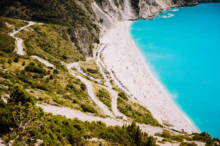 Serpentine road to famous Myrtos Beach. Favorite visiting place on Kefalonia, Greece