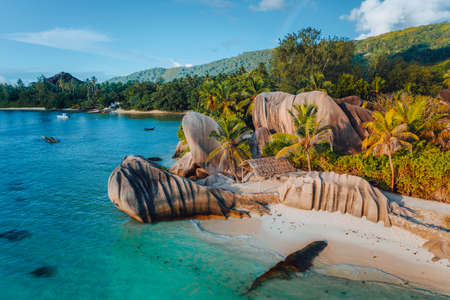 Anse Source D Argent beach, Seychelles. Aerial drone photo of unique tropical island landscape at warm sunset lightの写真素材