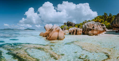 Impressive cloudscape at beautiful Anse Source dArgent beach, La Digue Island, Seychelles....