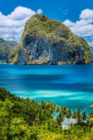 Breathtaking view of tropical coast with jungle and Pinagbuyutan Island in the blue ocean El Nido, Palawan, Philippines. Must see, most unique beautiful natural sceneryの写真素材