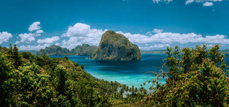 Palawan Archipelago. Panoramic shot of El Nido jungle coastline and amazing tropical Pinagbuyutan Island surrounded by Blue Ocean. Paradise travel concept destinationsの写真素材