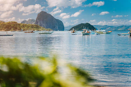 Beautiful tropical scenery. El-Nido, Philippines. Banca boats resting on tranquil early morning at Corong Corong lagoon.の写真素材