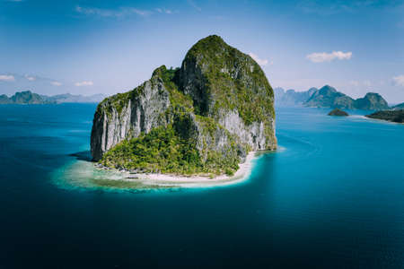 El Nido, Palawan, Philippines. Impressive aerial drone above view of unique Pinagbuyutan Island. El Nido village in backgroundの写真素材