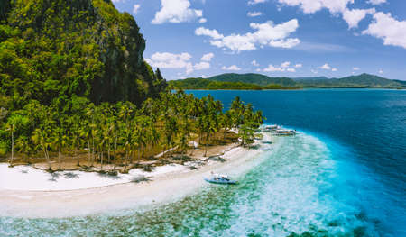 Epic Pinagbuyutan Island, El Nido, Palawan, Philippines. Aerial drone view of remote secluded...