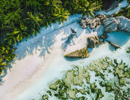 Seychelles, La Digue. Top aerial view of beautiful paradise tropical beach Anse Source D Argent. Summer vacation and travel concept.の写真素材