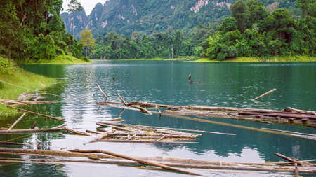 Cheo Lan Lake in Khao Sok, Suratani, Thailand. Rainy Clouds. Low Season
