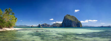 Palawan, Philippines. Tropical panorama view of El Nido coastline with huge rocky island on the background. National Marine Parkの写真素材