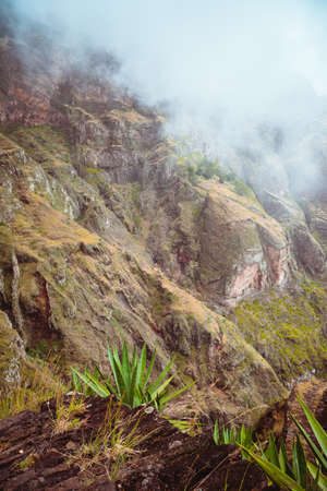Santo Antao island at Cabo Verde. Volcano terrain with mountain edges and yucca plants.
