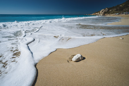 Waves on Milos sandy beach - Agios Nikitas village on Lefkada Ionian island, Greece. travel conceptの写真素材