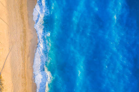 Aerial top down view of turquoise waters of Milos Beach, Lefkada island, Greeceの写真素材
