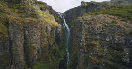 The second tallest Icelandic waterfall Glymur Majestic valley in Iceland, view of waterfall, rocks and stones Hvalfjordur Fjordの写真素材