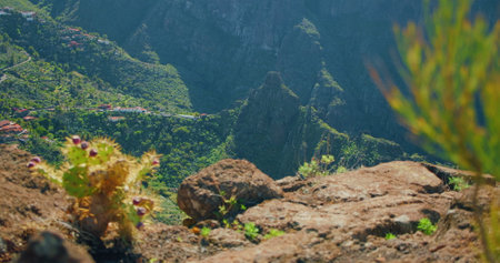 Beautiful view of the Masca Gorge or Barranco de Maska from the peak of the mountain peak. Rocky mountains in the foreground. Mirador La Cruz de Hilda.の写真素材