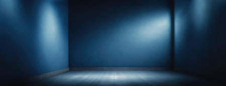 Empty room with dim spotlight on blue walls and floor. Panorama with coy space, background..の素材