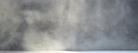 A soft, diffused cloudy sky with a mix of gray and white hues Panorama with copy spaceの素材