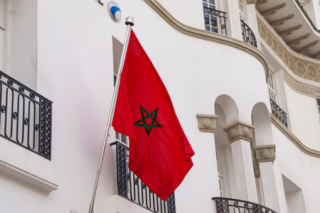 Waving Moroccan Flag with the Sky as the Backgroundの写真素材