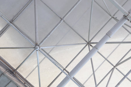 A background of horizontal, vertical, and diagonal white lines crossing each otherの写真素材