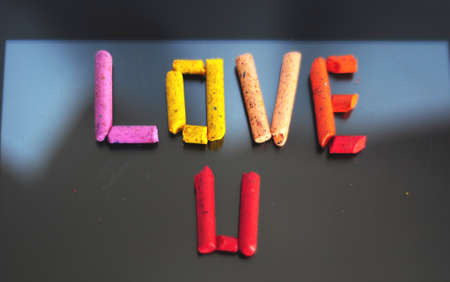 I love you writing from colorful crayon piecesの写真素材