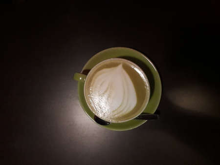 coffee latte with a motive flower shapeの写真素材