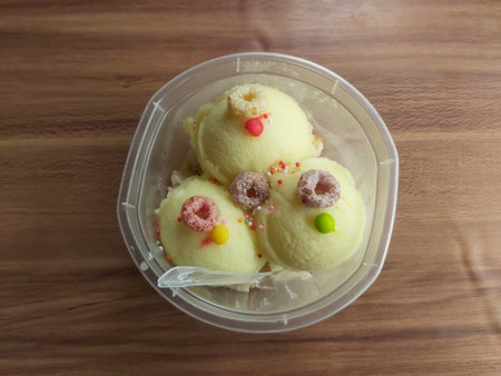 Fresh Durian Ice Cream Dessert on Wooden Table. Still life photography of Durian ice cream on the table, shooting in studio. Popular fruit for dessert in Asianの写真素材