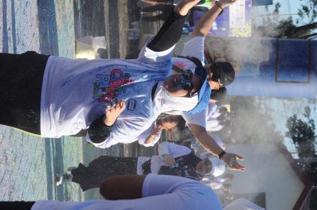 Unidentified Thai students 4 - 8 years old in ceremony uniform during sport parade in ko samui,...