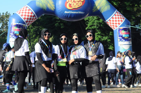 Unidentified Thai students 4 - 8 years old in ceremony uniform during sport parade in ko samui,...