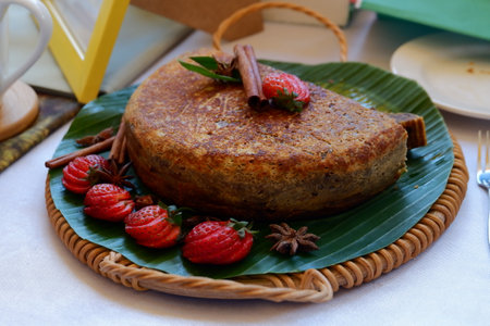 Pumpkin cake with strawberries and cinnamon.の写真素材