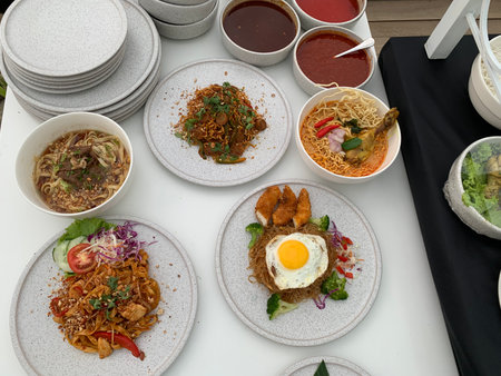 Top view of Thai food on the table in a restaurant, Thailand.