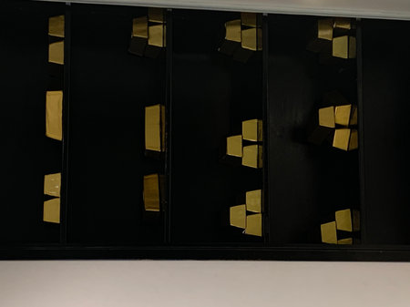 Black wall with gold bars. Black wall with gold bars on white background