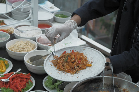 cooking food at the kitchen of a restaurant or cafe in Thailandの写真素材