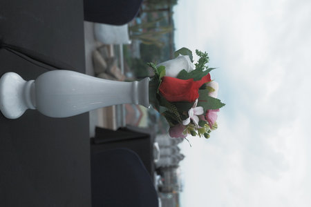 wedding bouquet of flowers on the background of the windowの写真素材