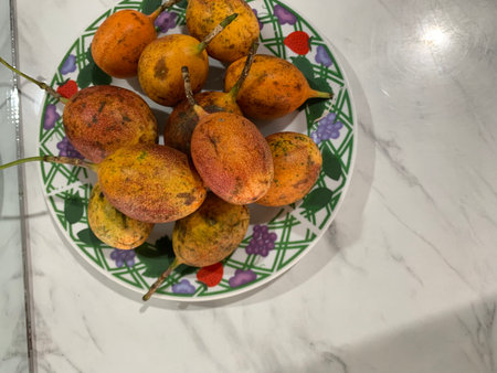 Passion fruit on a plate in the kitchen.