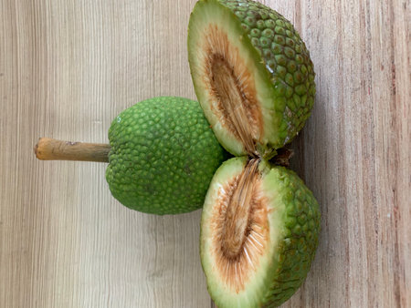 green fruit on a wooden background