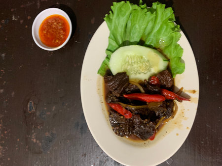 Thai food, stir-fried beef with chili and cucumberの写真素材