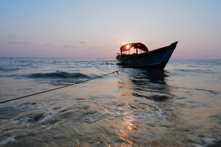 fishing boat in the sea at sunset, thailand, Asia