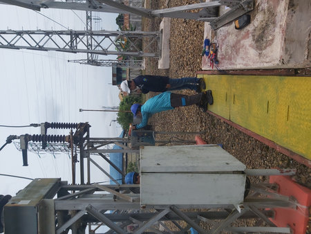 Workers are working on the construction of a high-rise building.