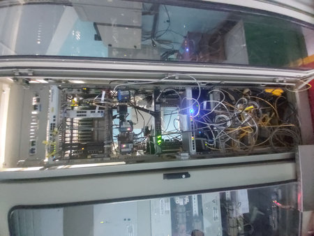 Inside of a bus in Bucharest, Romania, 2016. The bus is full of wires.
