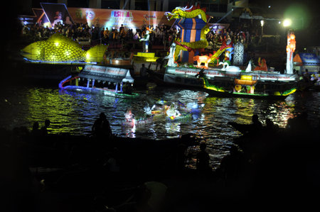 Unidentified people take part in the Festival of Lights in Bangkok, Thailand.