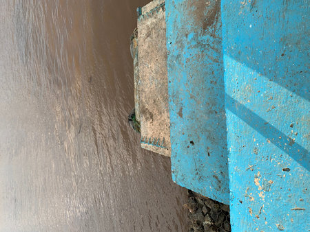 Blue concrete bridge over the river with shadow and sunlight from the windowの写真素材