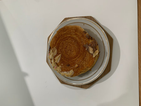 Cake with chocolate and nuts on a white background. top viewの写真素材