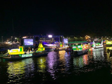 Tourist boats on the canal at night in Hanoi, Vietnam