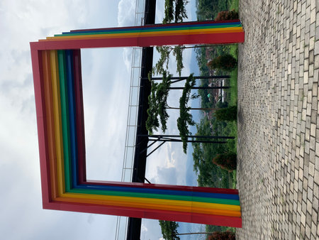 Rainbow in the form of a frame on the background of the buildingの写真素材