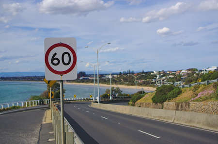 Frankston, VIC / Australia - Oct 14 2018: close up view of speed limit of 60 km per hour sign